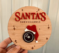 Coco & May wooden Santa Surveillance Plaque featuring a Santa surveillance camera Christmas design