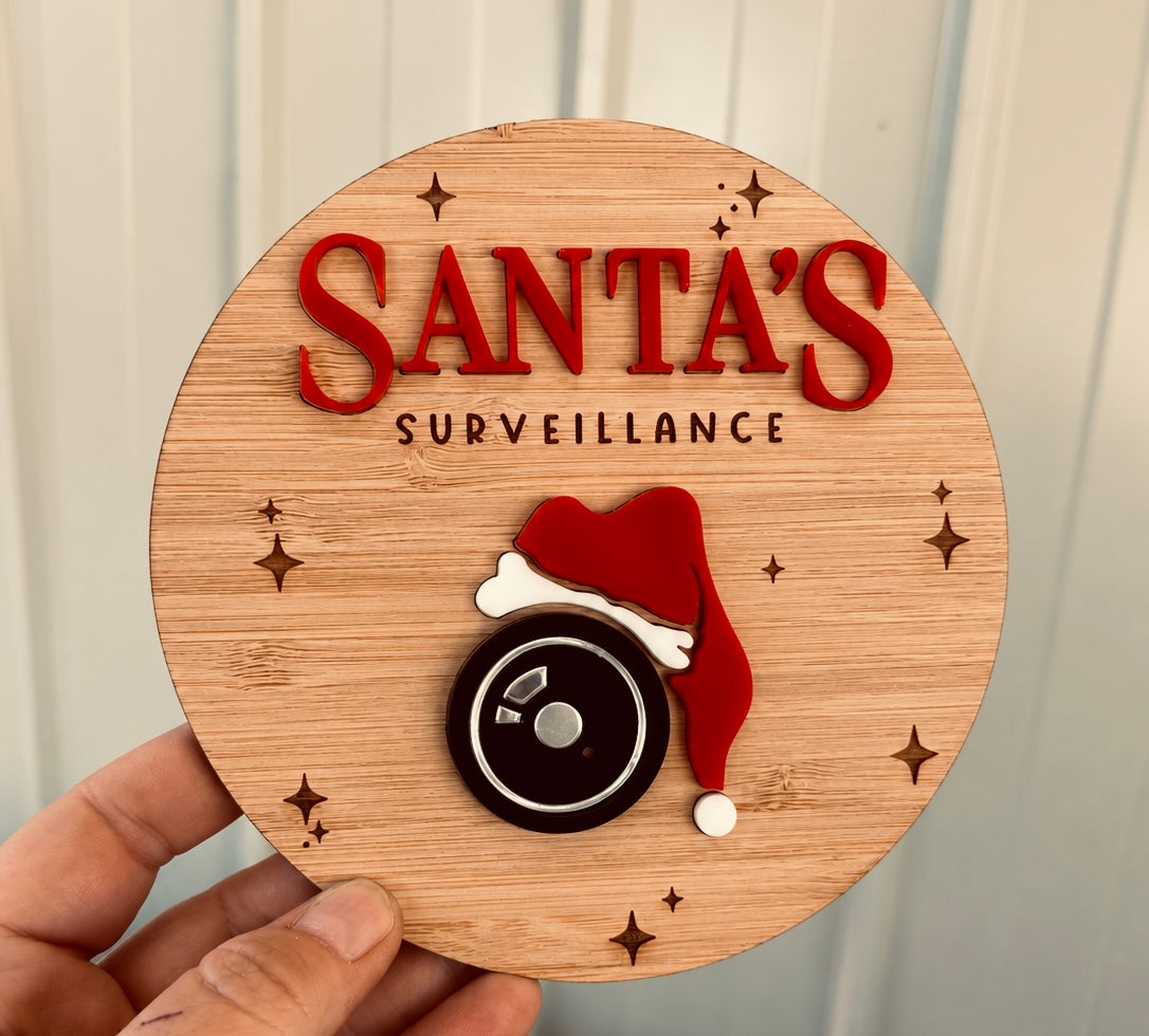Coco & May wooden Santa Surveillance Plaque featuring a Santa surveillance camera Christmas design