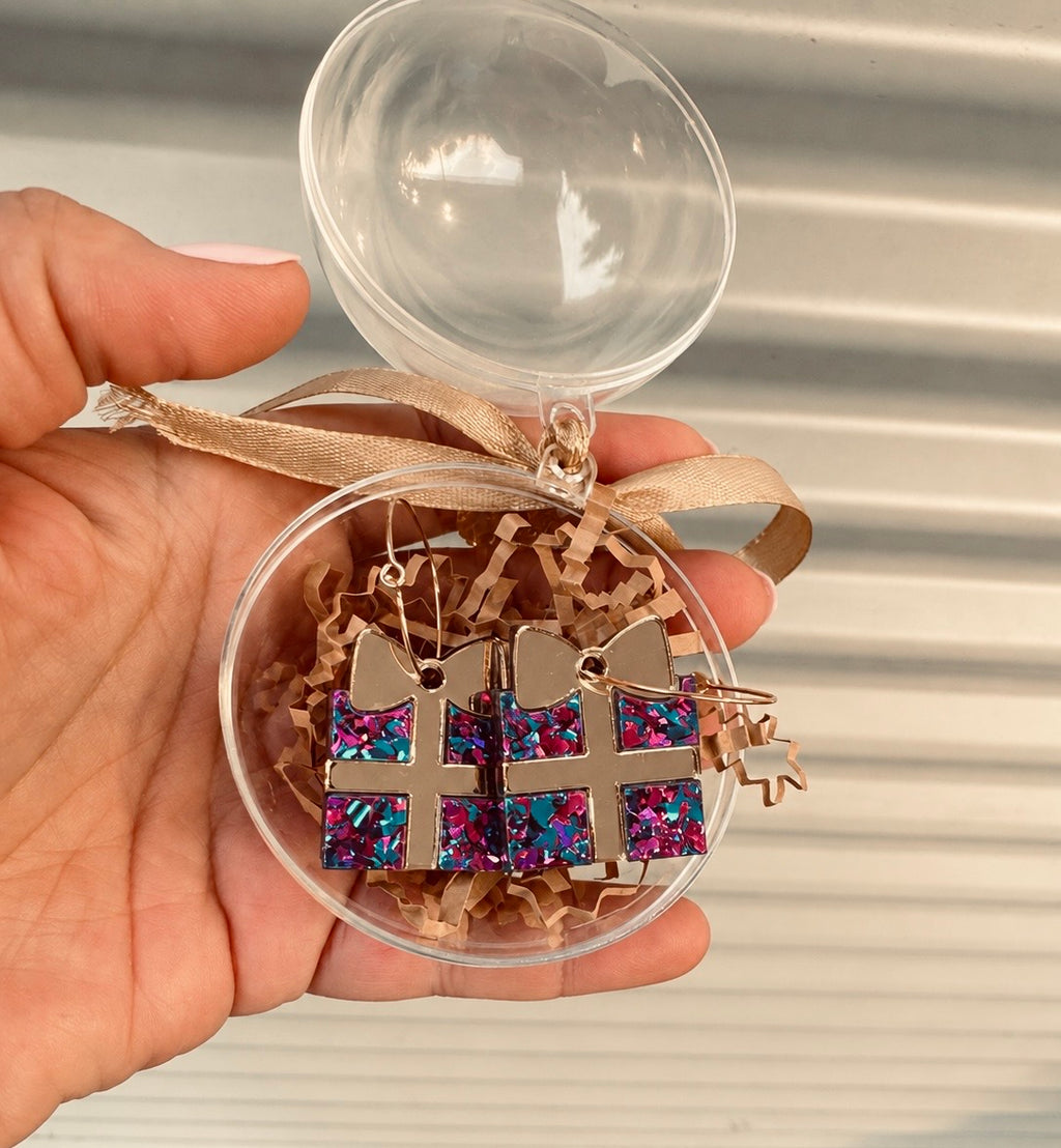 Festive acrylic dangle earrings featuring chunky glitter and reflective mirror gold details by Coco & May