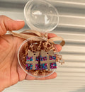 Festive acrylic dangle earrings featuring chunky glitter and reflective mirror gold details by Coco & May