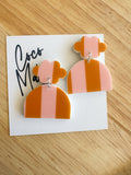 Coco orange dangle earrings by Coco and May on display card, lightweight statement acrylic earrings Australia
