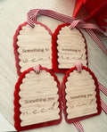 Coco & May set of four wooden Christmas Something Gift Tags in red and bamboo