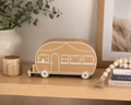 Caravan-shaped holiday savings money box by Coco & May, perfect for saving for family holidays, camping trips and caravan adventures.