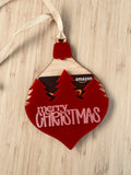 Red Christmas bauble gift card holder with festive Merry Christmas lettering, Christmas tree details and hanging ribbon by Coco & May
