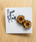 Layered wooden floral stud earrings with detailed design, lightweight statement studs
