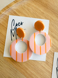 Cherry striped orange and white dangle earrings by Coco and May on display card, lightweight statement acrylic earrings Australia
