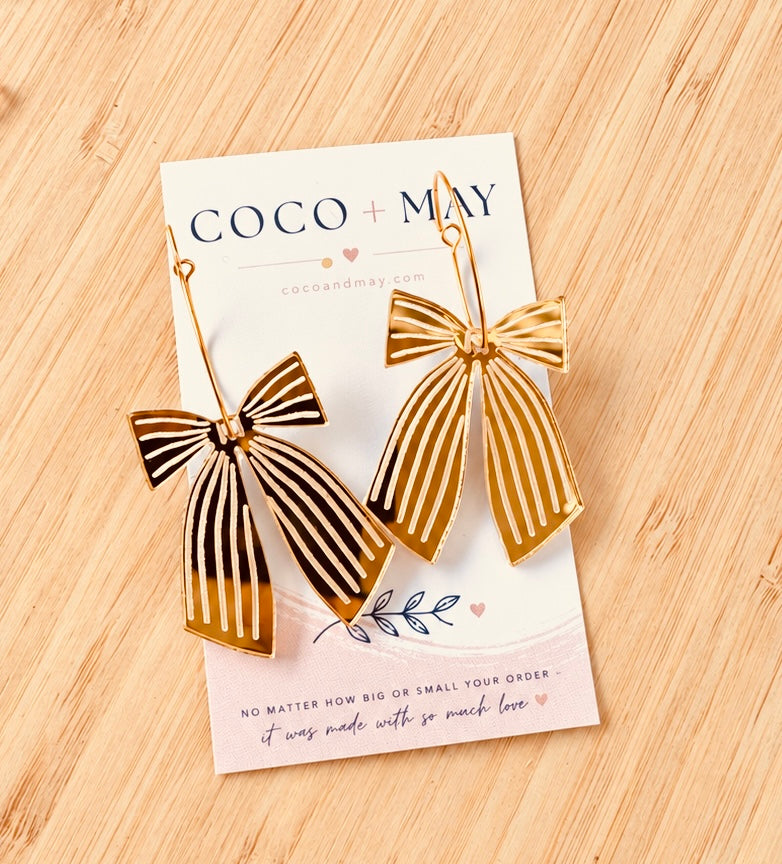 Shop mirror gold bow hoop earrings at Coco & May. Gorgeous statement earrings, perfect for teacher appreciation gifts, Christmas and everyday sparkle.