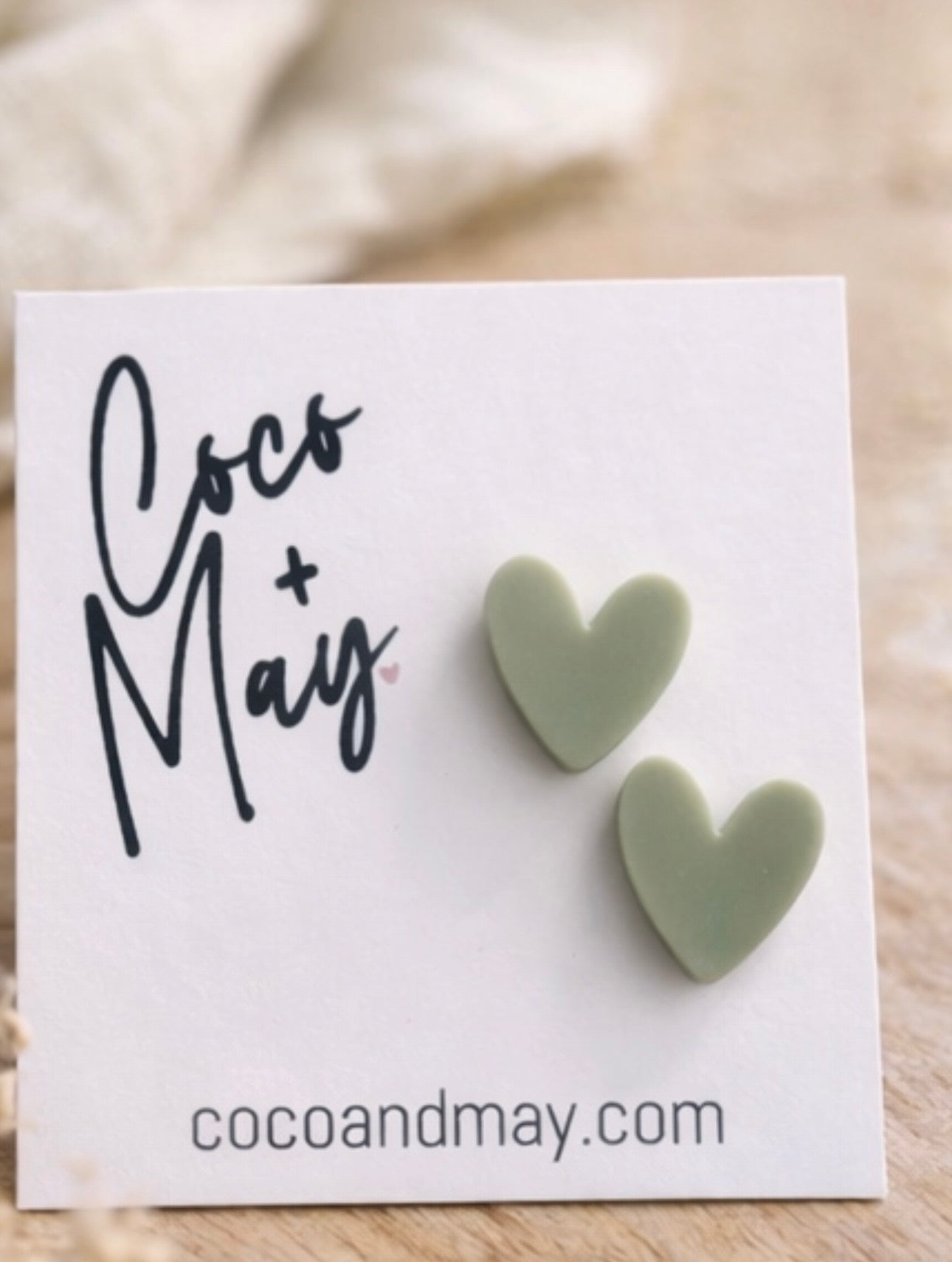 Fleur sage heart stud earrings by Coco and May on display card, cute lightweight earrings Australia
