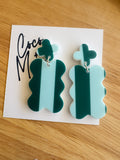 Aspen teal leaf dangle earrings by Coco and May on display card, lightweight botanical statement acrylic earrings Australia
