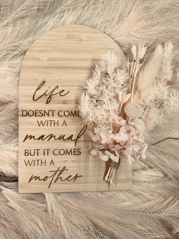 Life doesn’t come with a manual plaque