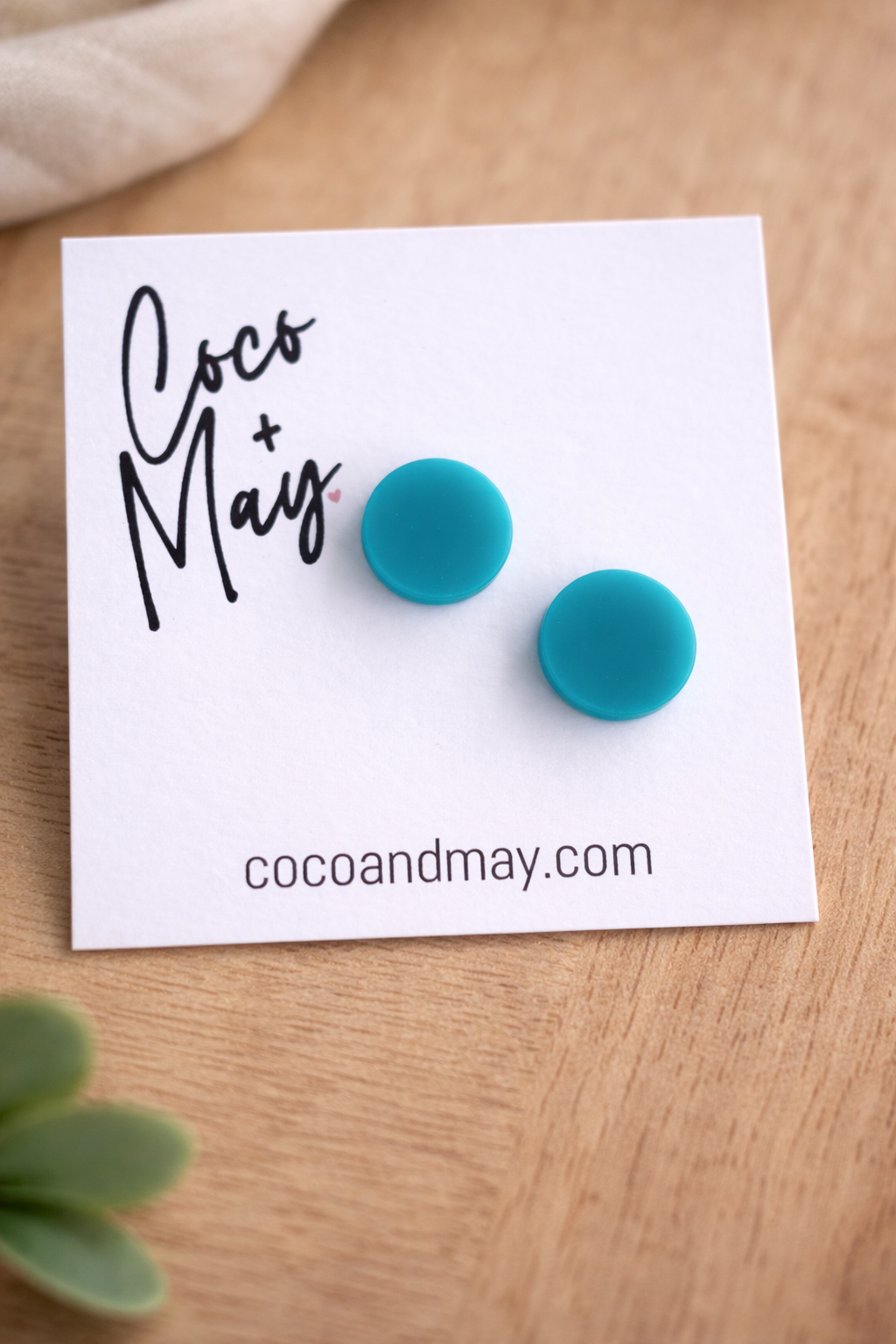 Dove teal stud earrings by Coco and May on display card, minimal bold lightweight earrings Australia

