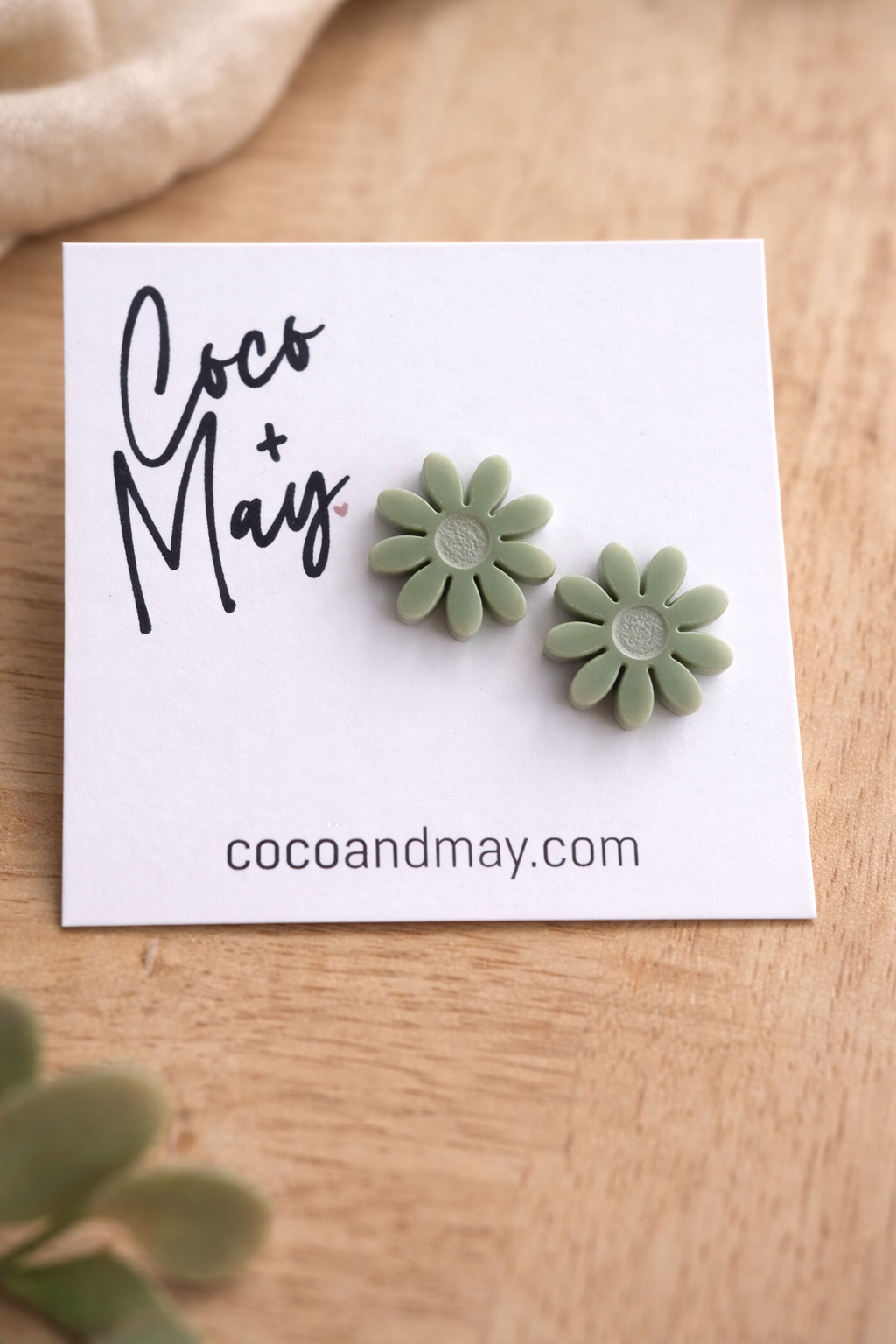 Pearl sage daisy stud earrings by Coco and May on display card, lightweight floral earrings Australia