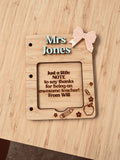 Personalised wooden teacher sticky note holder engraved with Mrs Jones, featuring decorative school-themed details and a teacher appreciation message