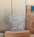 Personalised Toy Story inspired LED night light with custom name engraving, acrylic design and timber LED base for kids bedrooms and nurseries.