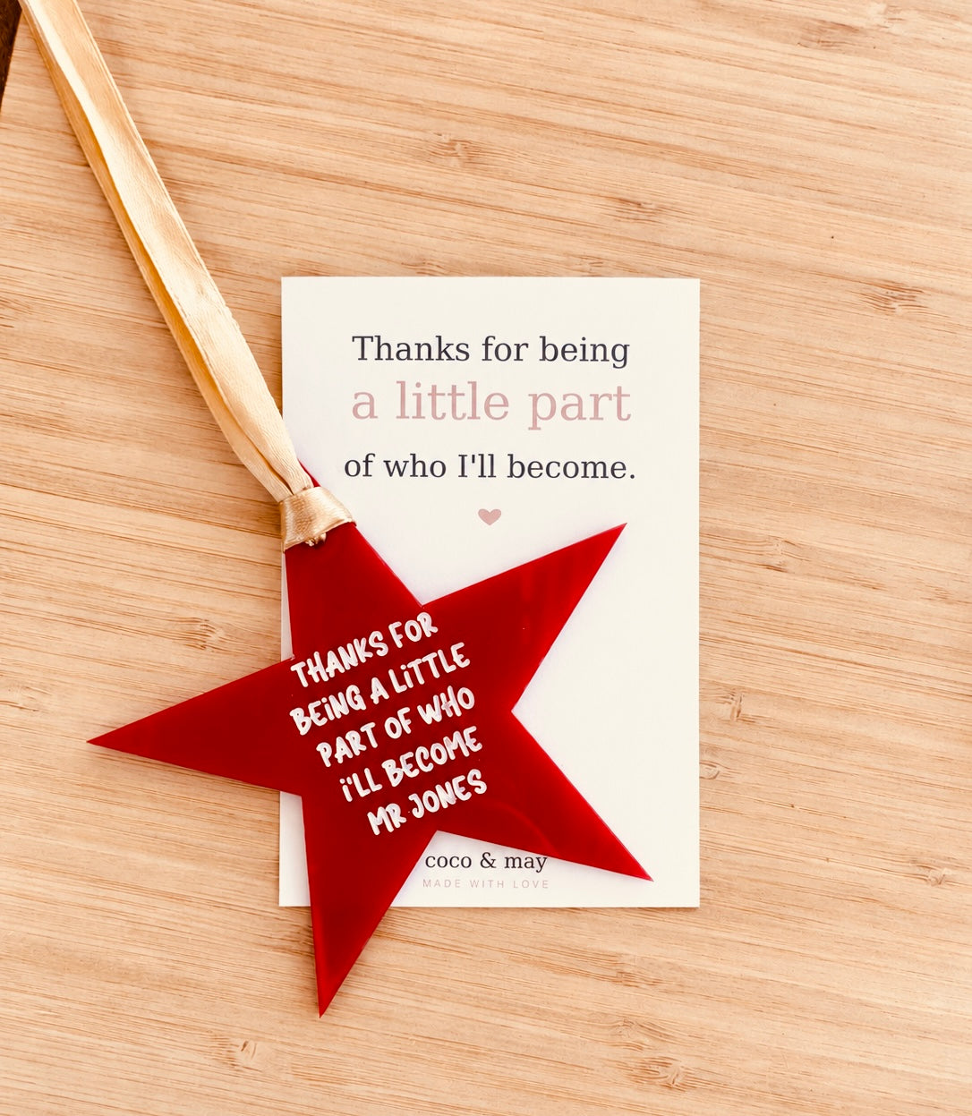 Red personalised Christmas star teacher ornament with hanging ribbon and heartfelt message, displayed on a Coco & May teacher appreciation gift card