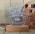 Personalised LED night light with custom engraved acrylic design and timber base