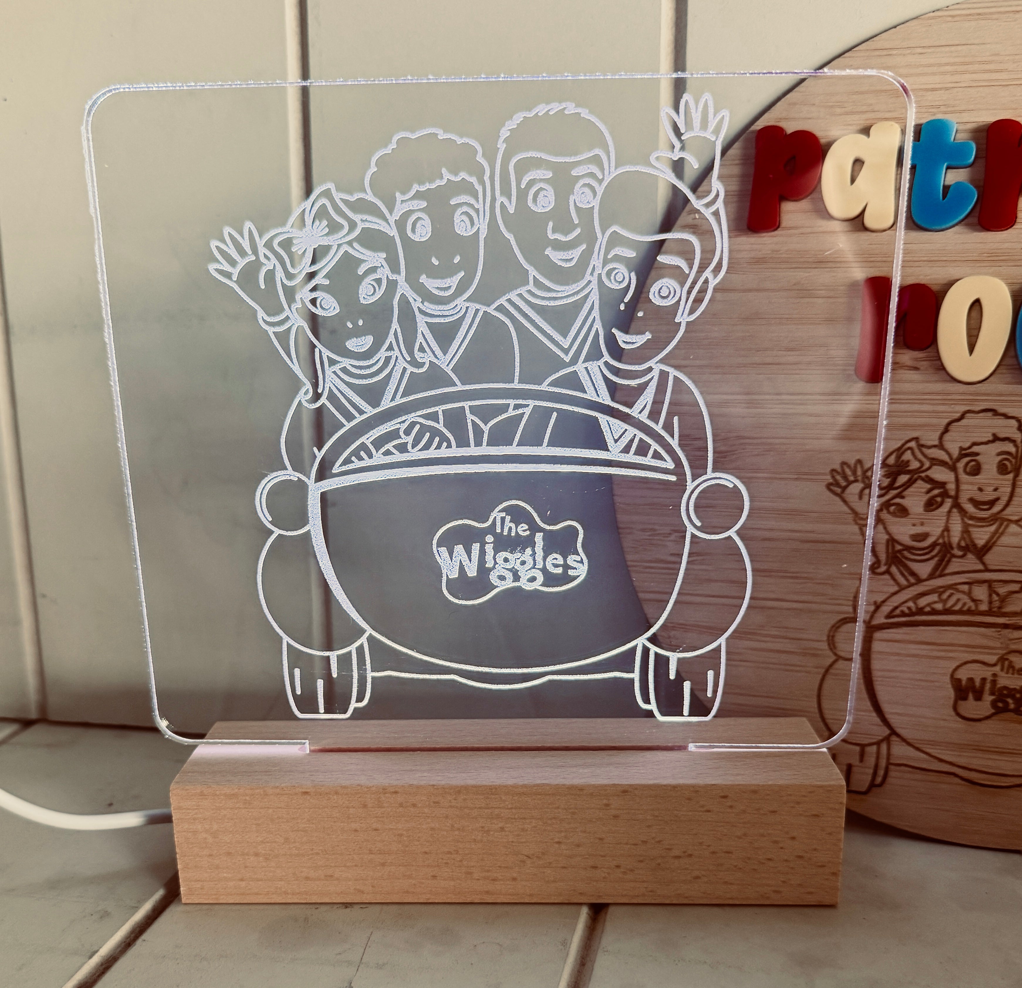 Personalised LED night light with custom engraved acrylic design and timber base