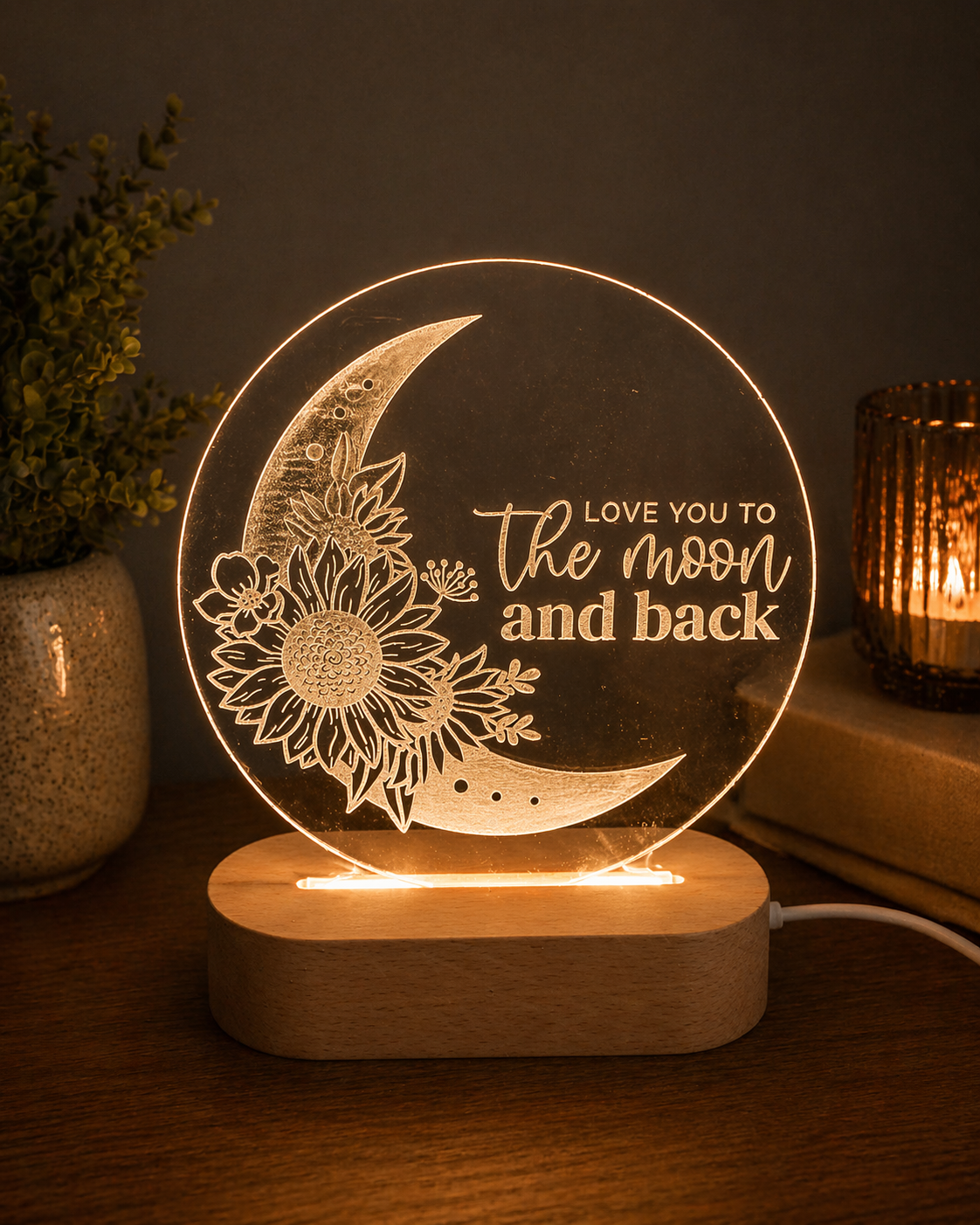 Love you to the moon and back LED night light with engraved moon design and colour changing base by Coco and May Australia

