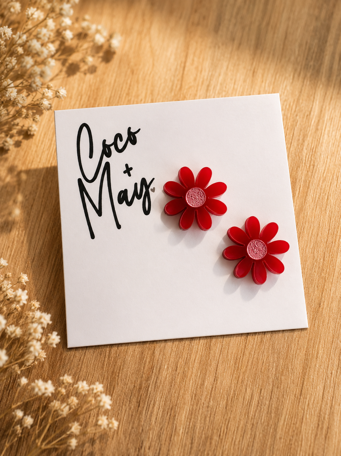 Red flower stud earrings by Coco & May