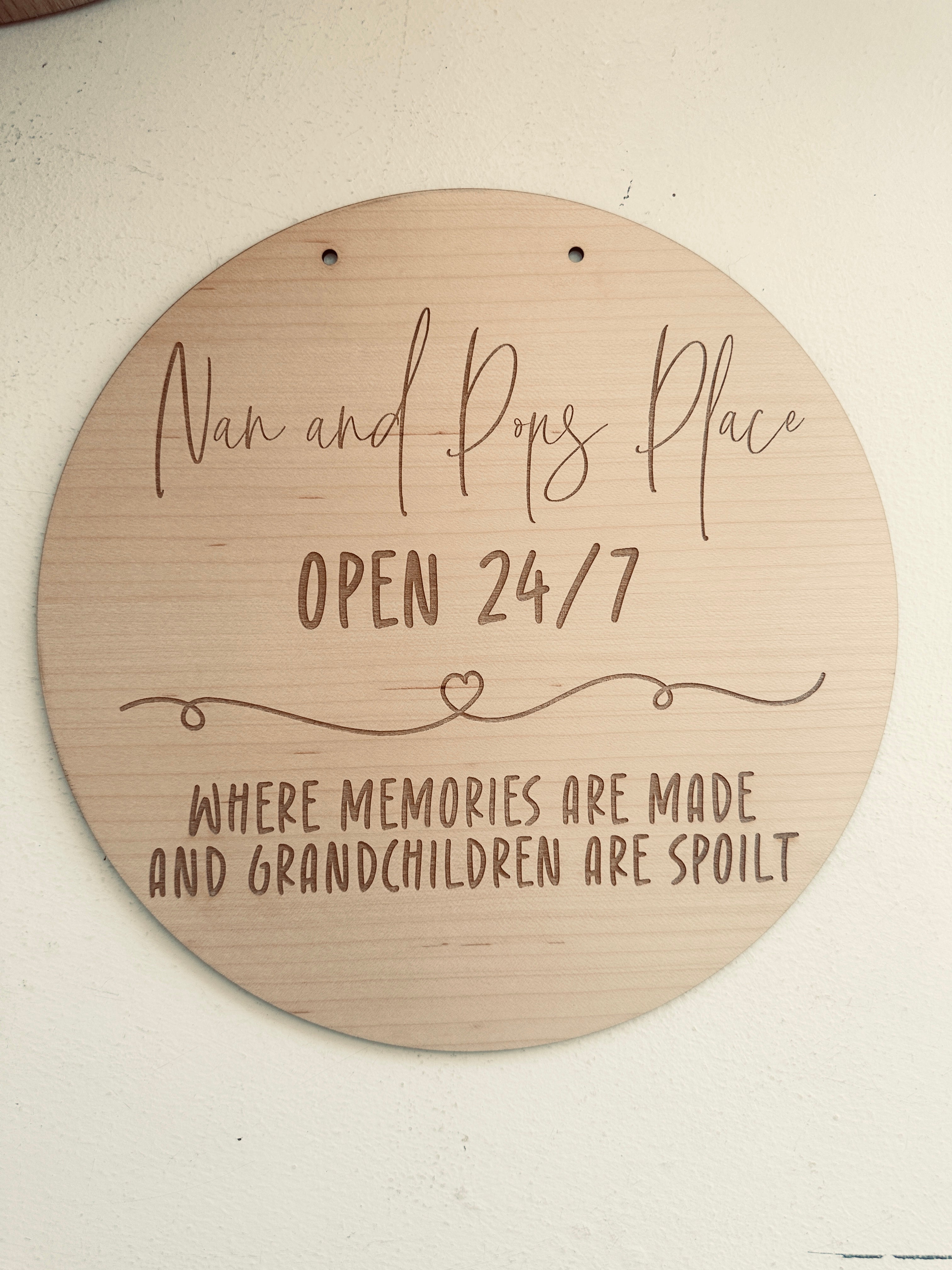Wooden plaque with the text 'Nan & Pop’s Place – Where memories are made and children are spoilt.
