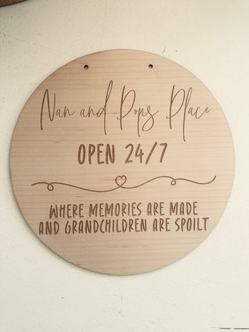 Wooden plaque with the text 'Nan & Pop’s Place – Where memories are made and children are spoilt.
